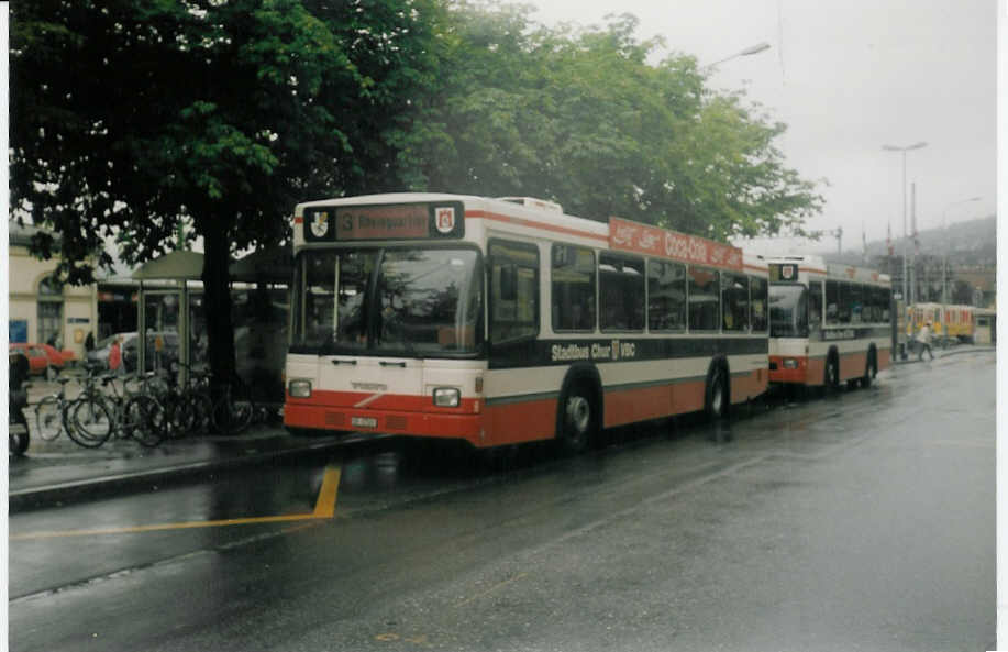 (018'407) - SBC Chur - Nr. 9/GR 97'509 - Volvo/Lauber (ex Roth, Chur Nr. 14) am 2. August 1997 beim Bahnhof Chur