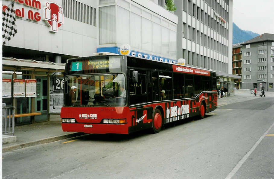 (032'717) - SBC Chur - Nr. 12/GR 97'512 - Neoplan am 26. Juni 1999 beim Bahnhof Chur