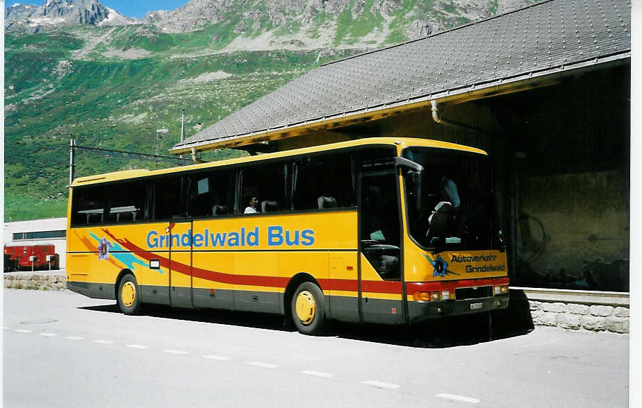 (048'719) - AVG Grindelwald - Nr. 12/BE 171'453 - MAN am 23. Juli 2001 beim Bahnhof Andermatt