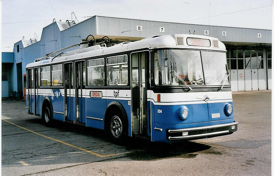 (052'032) - TPF Fribourg - Nr. 334 - Saurer/Hess Trolleybus (ex TF Fribourg Nr. 34) am 17. Februar 2002 in Fribourg, Garage