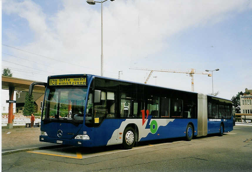 (060'724) - VZO Grningen - Nr. 59/ZH 691'893 - Mercedes am 21. Juni 2003 beim Bahnhof Wetzikon