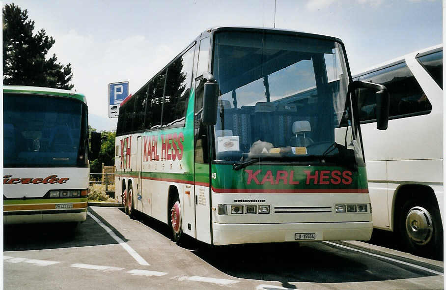 (061'318) - Hess K., Luzern - Nr. 43/LU 15'554 - Drgmller am 7. Juli 2003 beim Bahnhof Interlaken West 