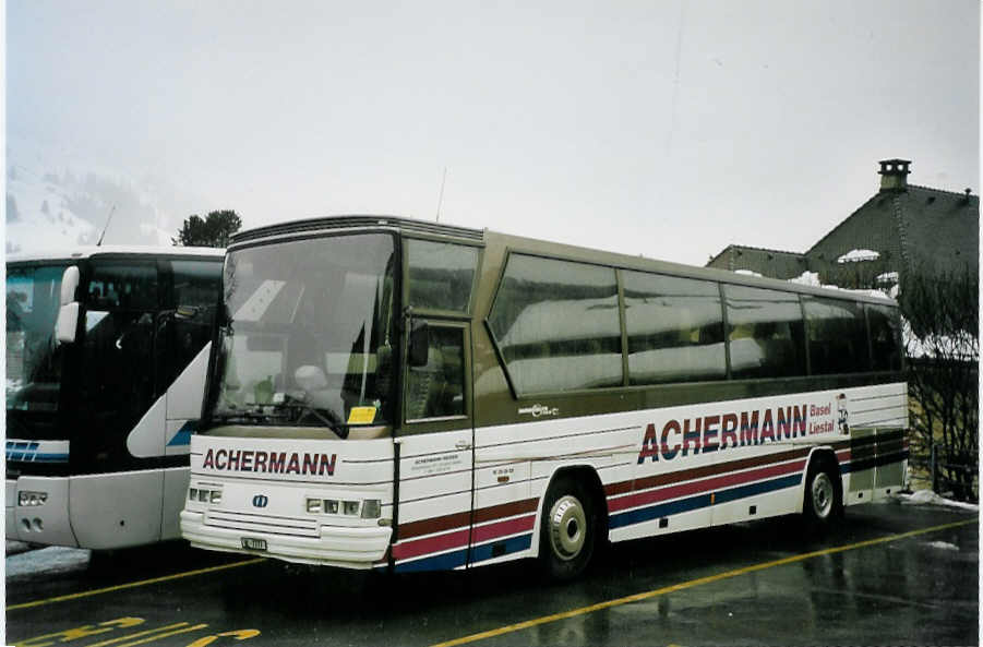 (065'419) - Achermann, Basel - BL 7777 - Drgmller am 7. Februar 2004 in Adelboden, Landstrasse