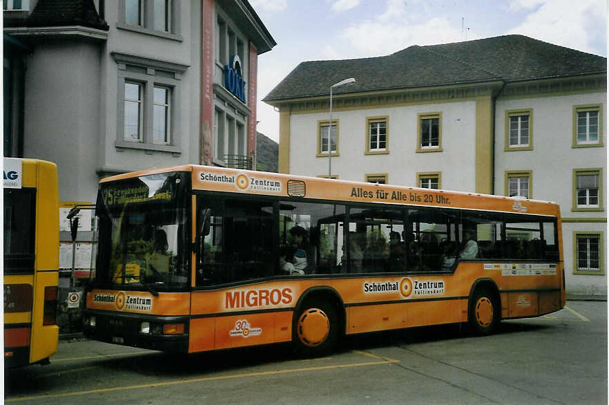 (069'224) - AAGL Liestal - Nr. 56/BL 7861 - MAN/MAN-Lauber am 10. Juli 2004 beim Bahnhof Liestal