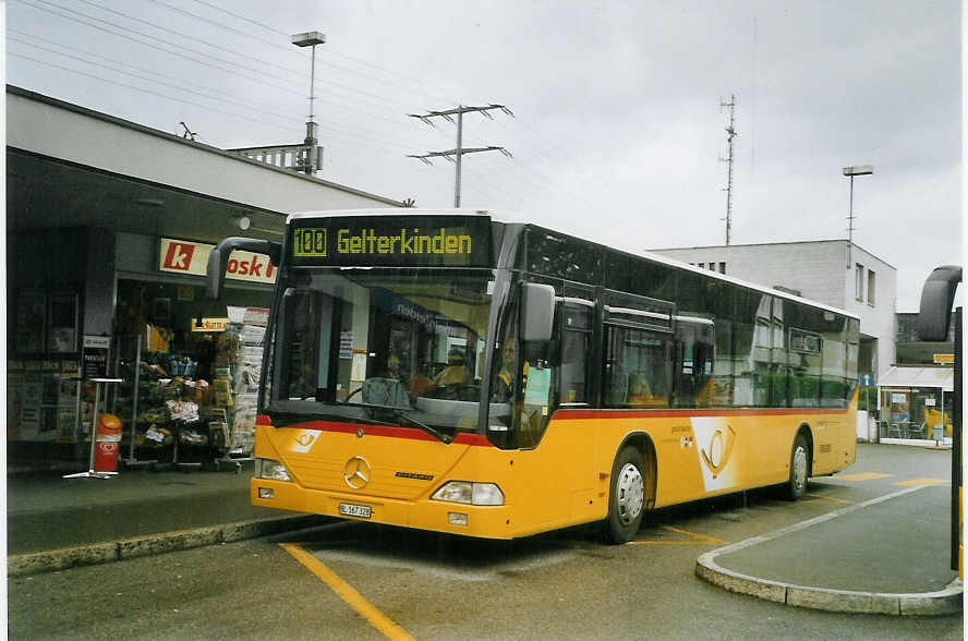 (069'236) - PostAuto Nordwestschweiz - BL 167'328 - Mercedes (ex P 25'224) am 10. Juli 2004 beim Bahnhof Rheinfelden