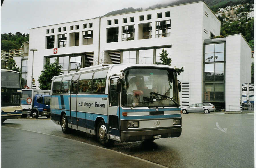 (088'700) - Wenger, Fahrni - BE 449'450 - Mercedes (ex Famo, Sderen) am 3. August 2006 beim Bahnhof Locarno