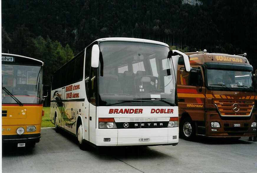 (089'405) - Brander, Btschwil - SG 6497 - Setra am 2. September 2006 in Interlaken, Flugplatz