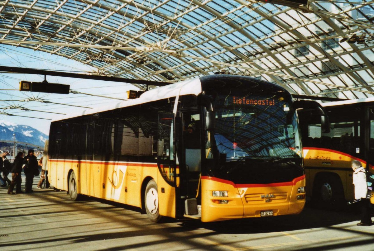 (115'025) - PostAuto Graubnden - GR 162'976 - MAN am 14. Mrz 2009 in Chur, Postautostation