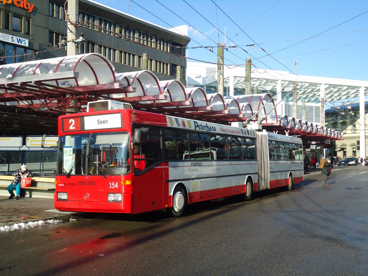 (131'526) - SW Winterthur - Nr. 154 - Mercedes Gelenktrolleybus am 9. Dezember 2010 beim Hauptbahnhof Winterthur