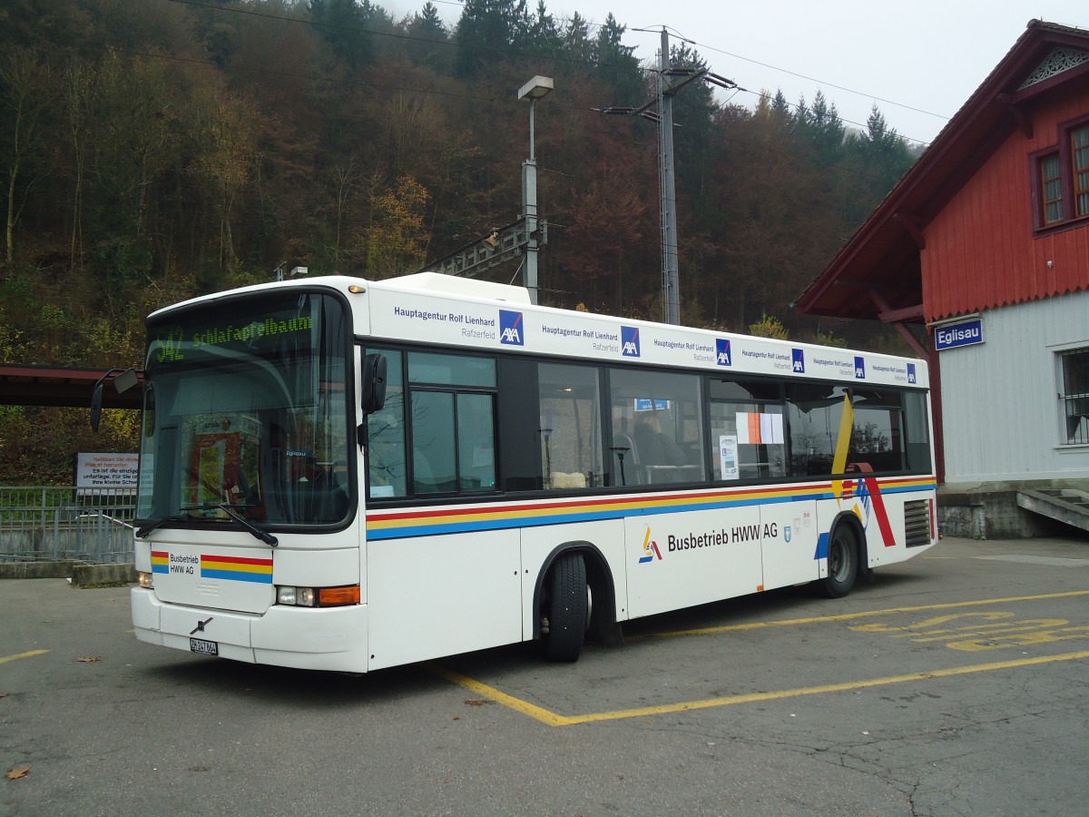 (136'970) - HWW Wil - Nr. 74/ZH 247'864 - Volvo/Hess am 24. November 2011 beim Bahnhof Eglisau