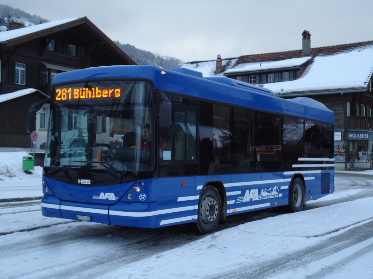 (142'896) - AFA Adelboden - Nr. 57/BE 272'798 - Scania/Hess am 2. Januar 2013 beim Bahnhof Lenk