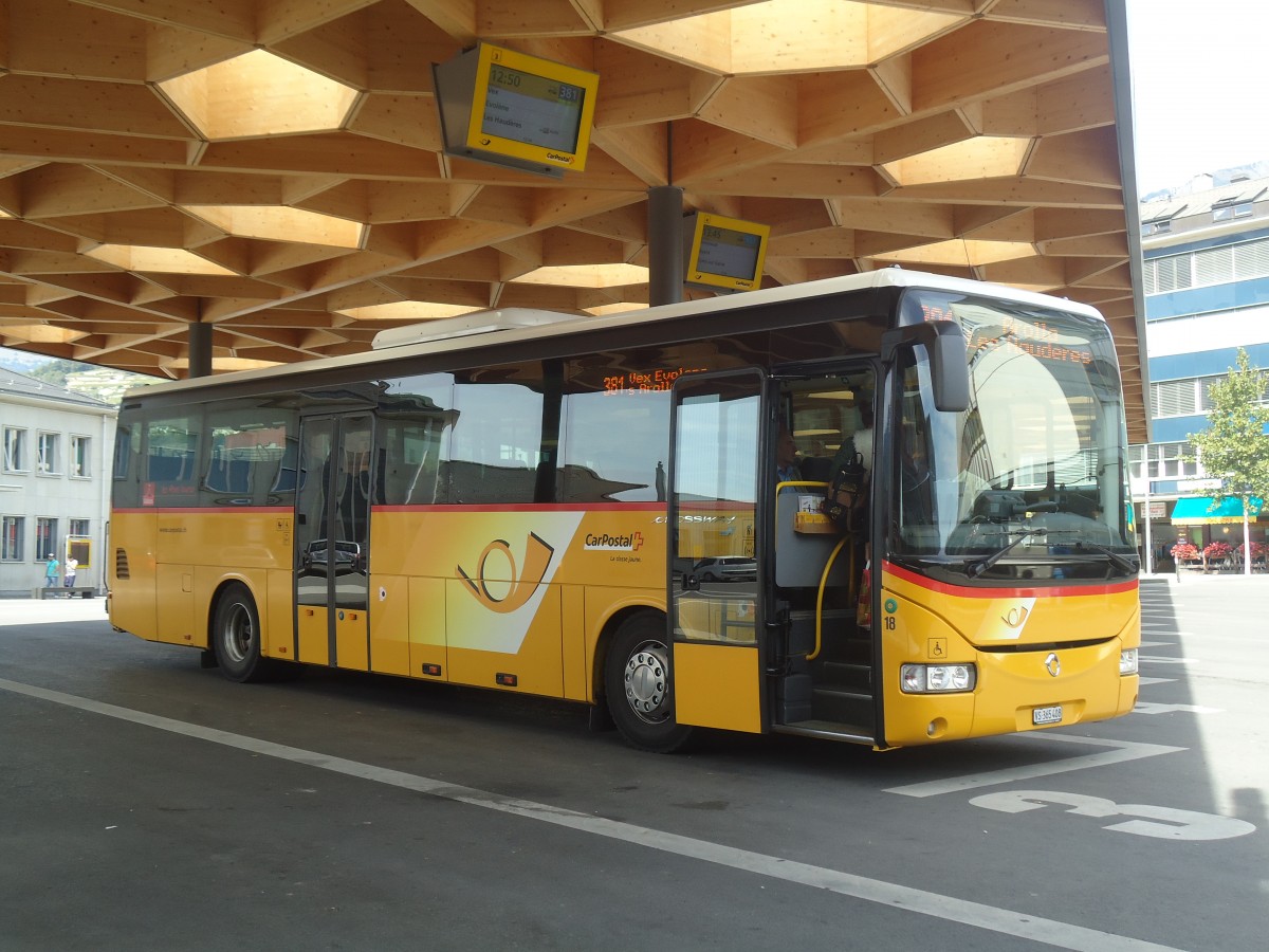 (147'319) - PostAuto Wallis - Nr. 18/VS 365'408 - Irisbus am 22. September 2013 beim Bahnhof Sion