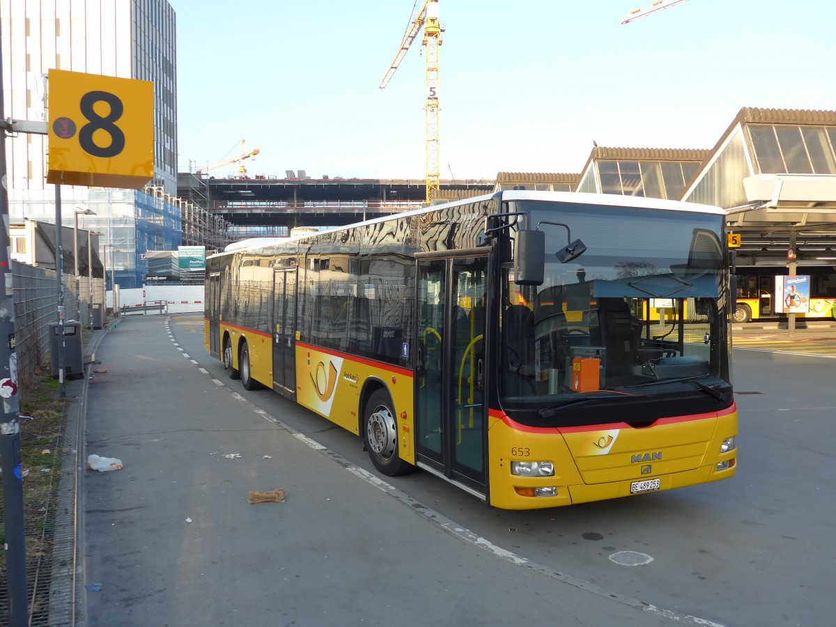 (149'179) - PostAuto Bern - Nr. 653/BE 489'253 - MAN am 9. Mrz 2014 in Bern, Postautostation