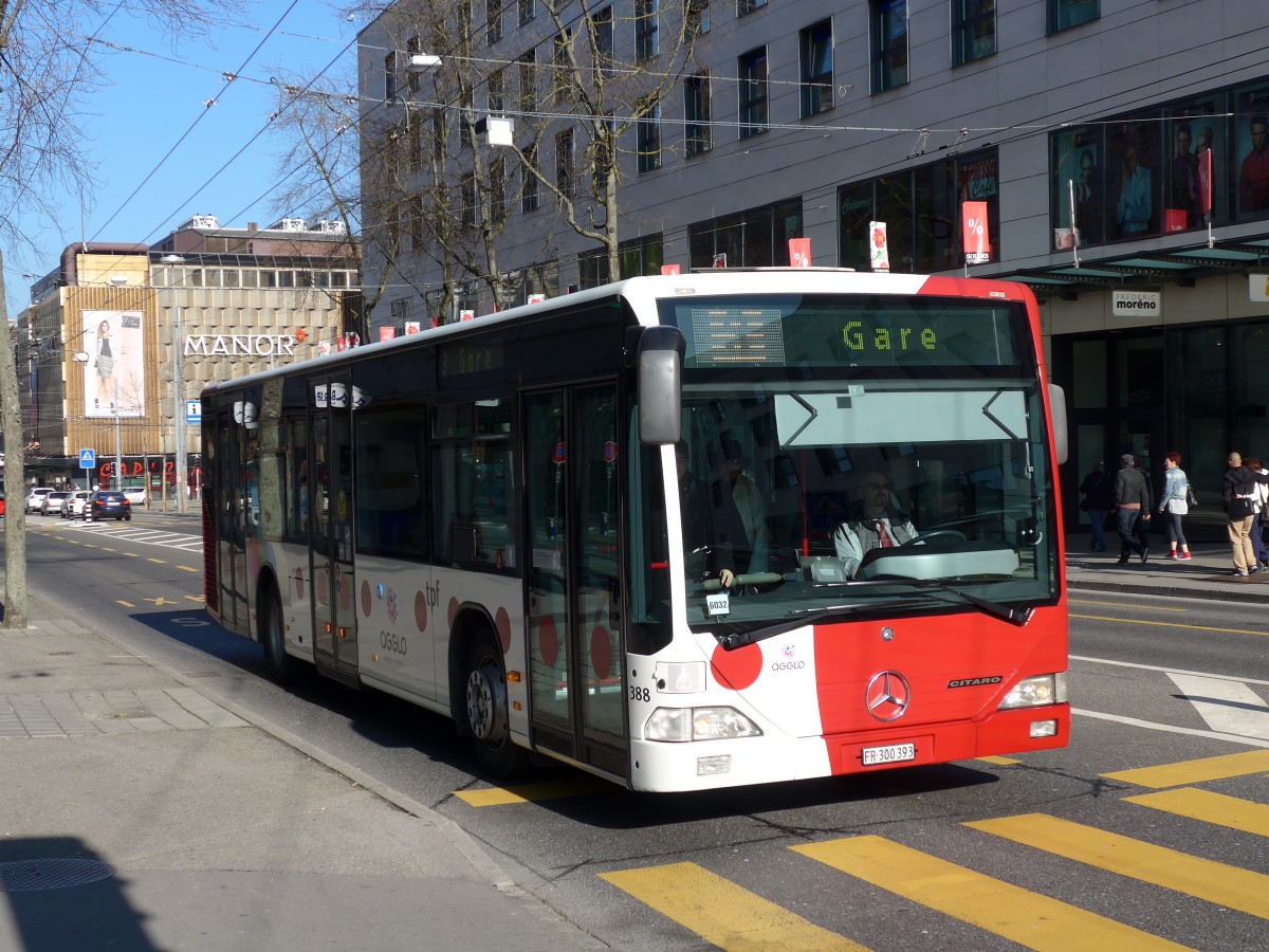 (149'279) - TPF Fribourg - Nr. 388/FR 300'393 - Mercedes am 9. Mrz 2014 beim Bahnhof Fribourg