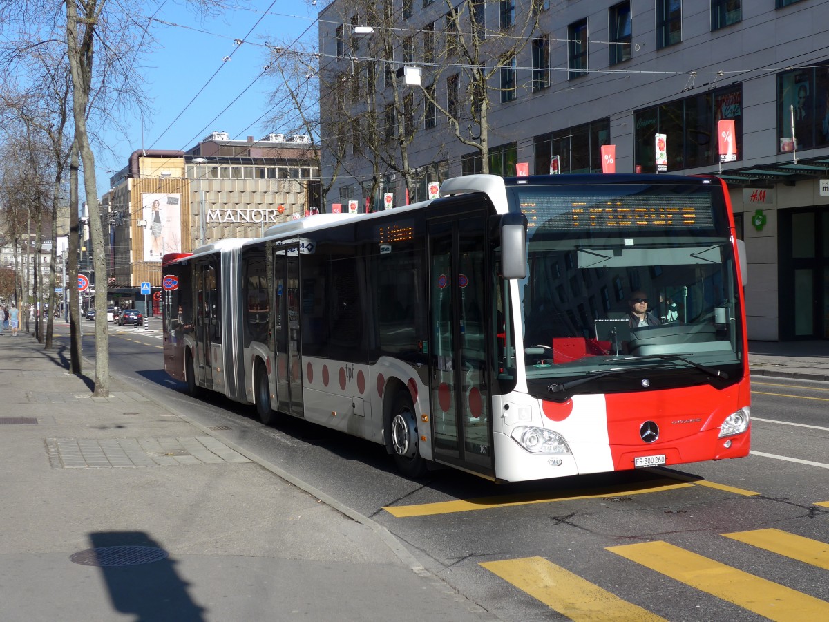 (149'280) - TPF Fribourg - Nr. 167/FR 300'260 - Mercedes am 9. Mrz 2014 beim Bahnhof Fribourg