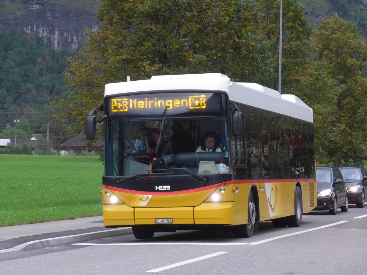 (154'688) - AVG Meiringen - Nr. 68/BE 401'568 - Scania/Hess (ex Nr. 59; ex Steiner, Messen) am 30. August 2014 in Meiringen, Bahnschranke