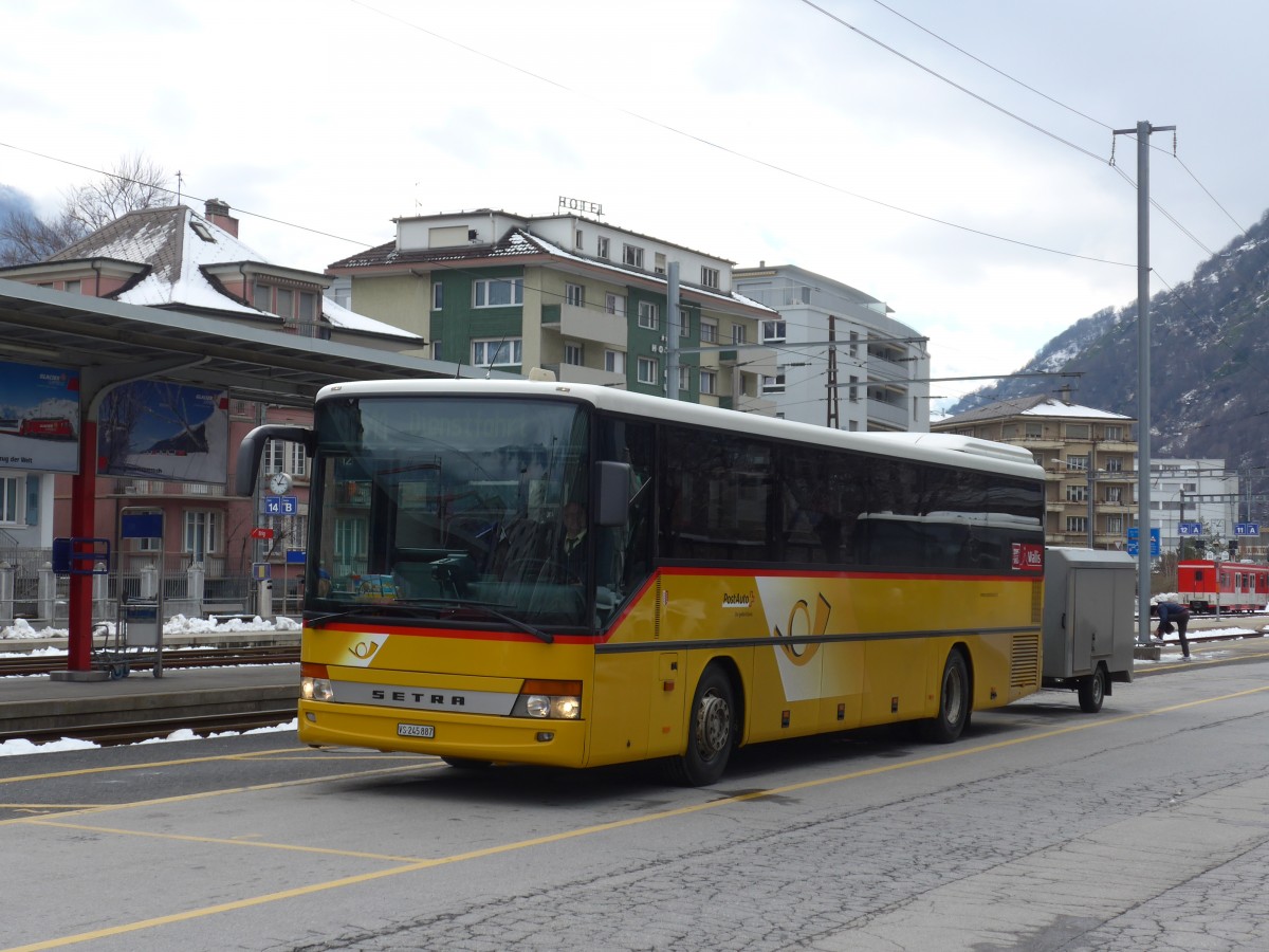 (158'854) - PostAuto Wallis - VS 245'887 - Setra am 22. Februar 2015 beim Bahnhof Brig