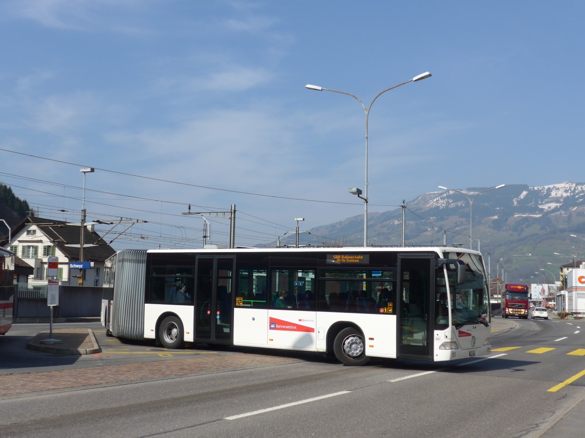 (159'320) - AAGS Schwyz - Nr. 84/SZ 118'684 - Mercedes (ex VR La Chaux-de-Fonds Nr. 228) am 18. Mrz 2015 beim Bahnhof Schwyz