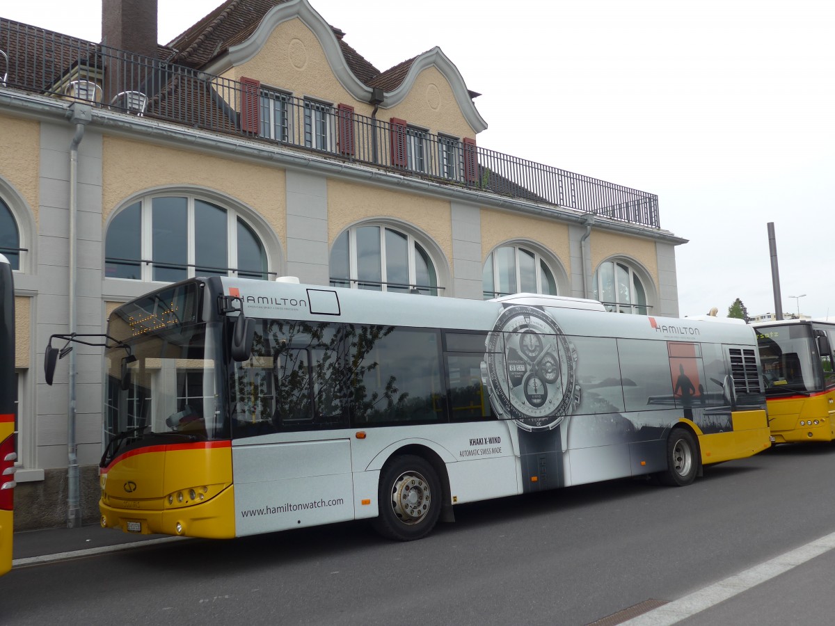 (159'969) - PostAuto Bern - BE 610'538 - Solaris am 25. April 2015 beim Bahnhof Spiez