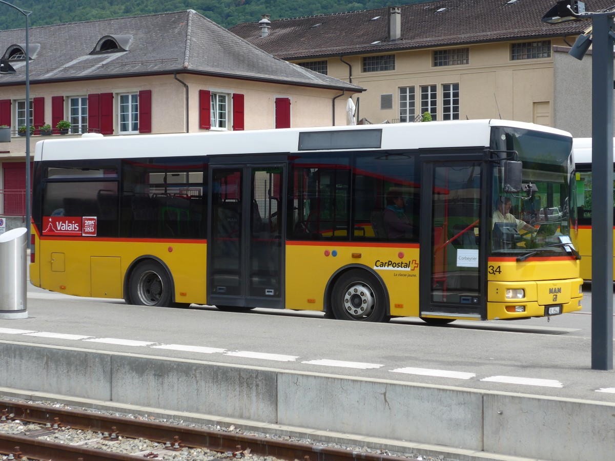(162'343) - MOB Montreux - Nr. 34/VS 89'443 - MAN/Gppel (ex TSAR Sierre; ex PostAuto Bern; ex PostAuto Berner Oberland; ex P 23'032) am 20. Juni 2015 beim Bahnhof Aigle