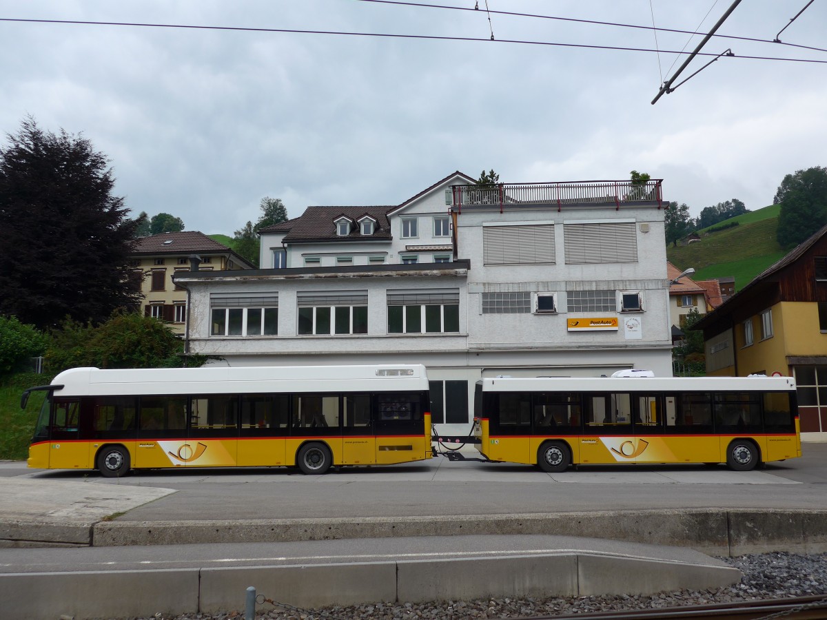 (163'215) - PostAuto Ostschweiz - SG 426'001 - Hess + SG 412'681 - Hess Personenanhnger am 2. August 2015 in Urnsch, Garage