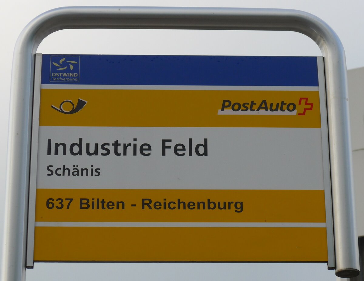 (166'063) - PostAuto-Haltestellenschild - Schnis, Industrie Feld - am 10. Oktober 2015