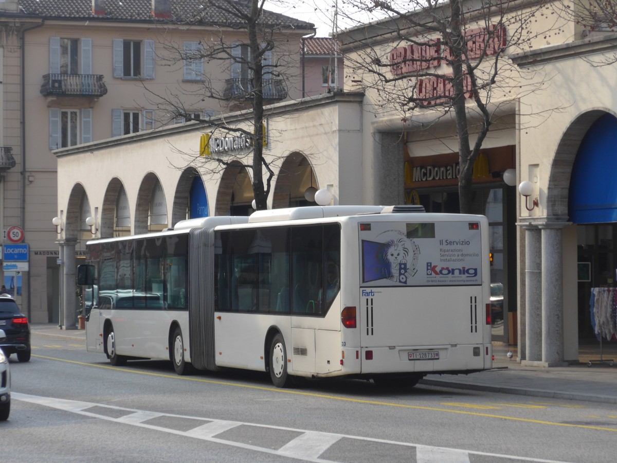 (168'630) - FART Locarno - Nr. 33/TI 128'733 - Mercedes (ex SBC Chur Nr. 92; ex ARL Viganello Nr. 23; ex TPL Lugano Nr. 29) am 6. Februar 2016 beim Bahnhof Locarno