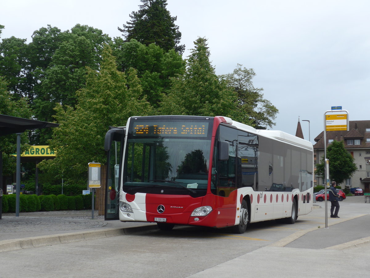 (171'777) - TPF Fribourg - Nr. 84/FR 300'384 - Mercedes am 13. Juni 2016 beim Bahnhof Ddingen