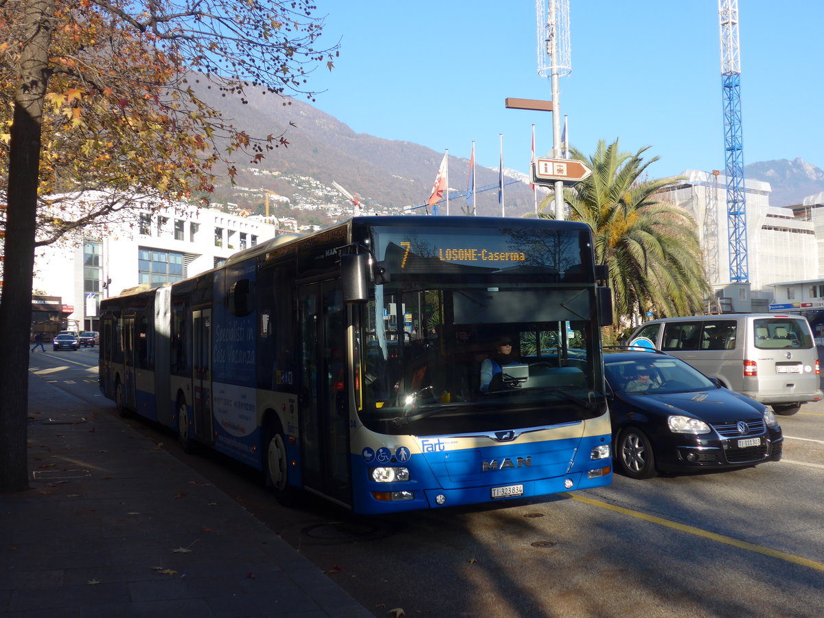 (199'774) - FART Locarno - Nr. 34/TI 323'834 - MAN am 7. Dezember 2018 beim Bahnhof Locarno