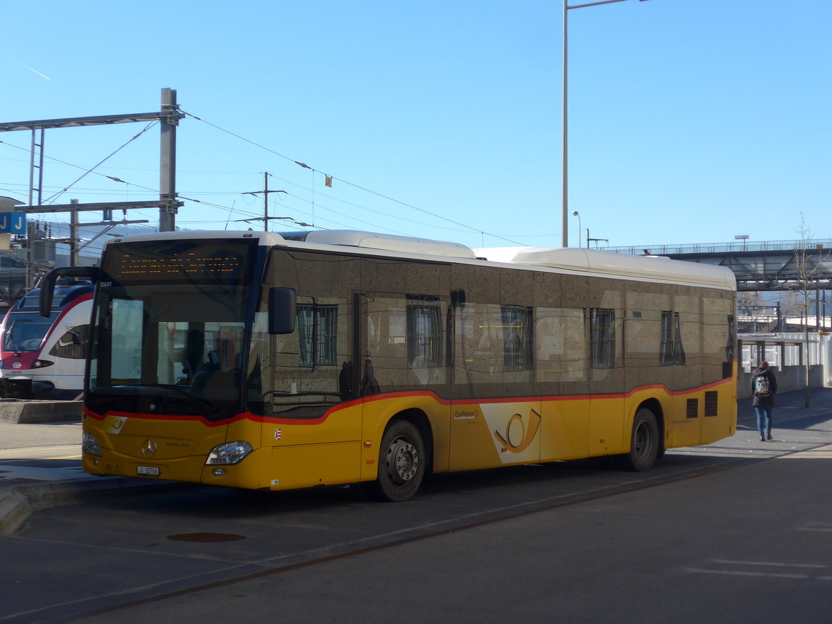 (201'581) - CarPostal Ouest - JU 32'766 - Mercedes (ex Nr. 26) am 16. Februar 2019 beim Bahnhof Delmont