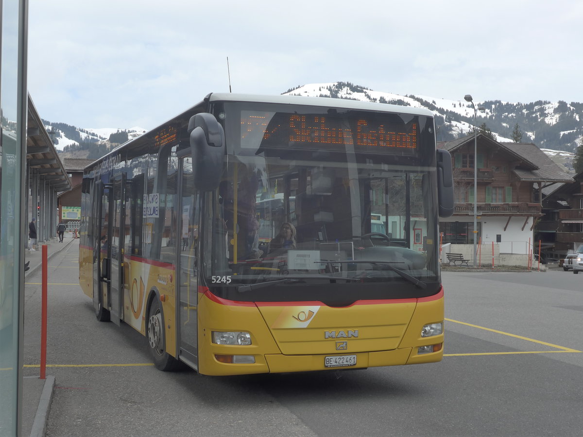 (215'140) - PostAuto Bern - BE 422'461 - MAN/Gppel (ex AVG Meiringen Nr. 61) am 14. Mrz 2020 beim Bahnhof Gstaad