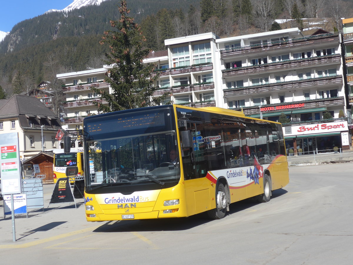(223'865) - Grindelwaldbus, Grindelwald - Nr. 13/BE 407'170 - MAN/Gppel am 28. Februar 2021 beim Bahnhof Grindelwald