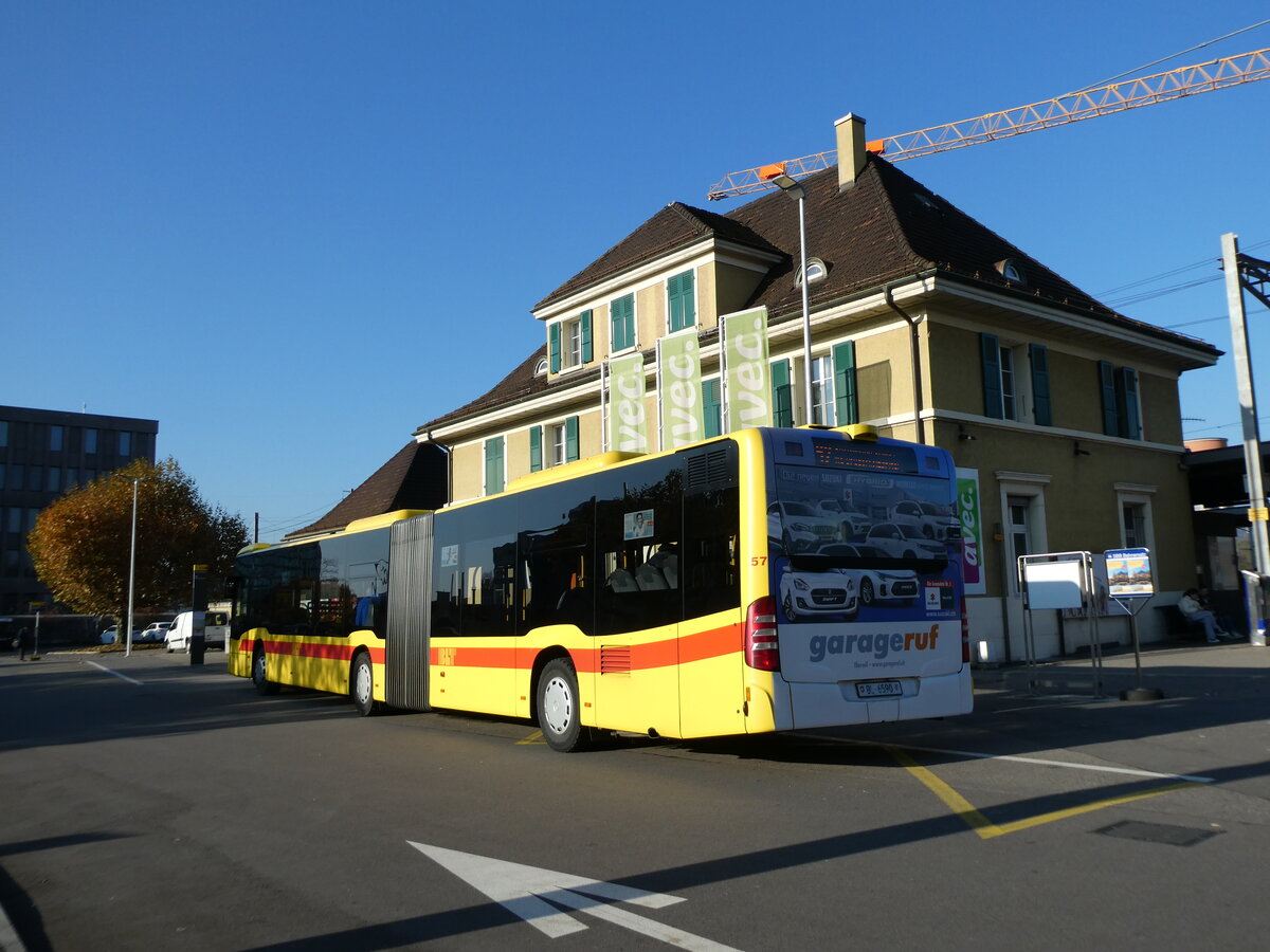 (230'267) - BLT Oberwil - Nr. 57/BL 6590 - Mercedes am 9. November 2021 beim Bahnhof Muttenz