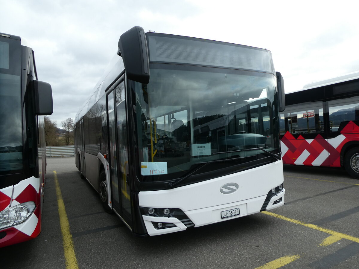(232'645) - CarPostal Ouest - JU 36'548 - Solaris am 6. Februar 2022 in Develier, Parkplatz
