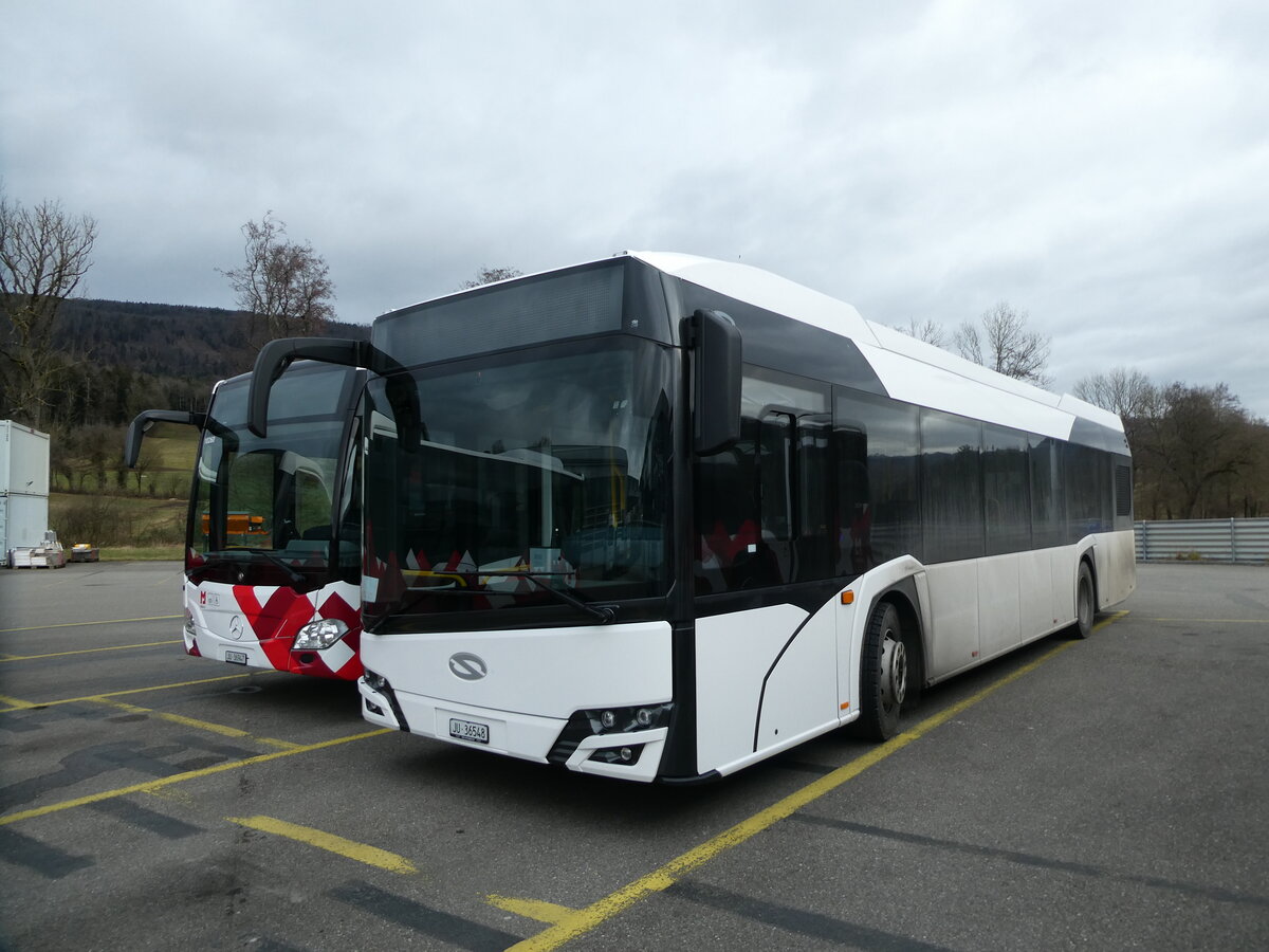 (232'646) - CarPostal Ouest - JU 36'548 - Solaris am 6. Februar 2022 in Develier, Parkplatz