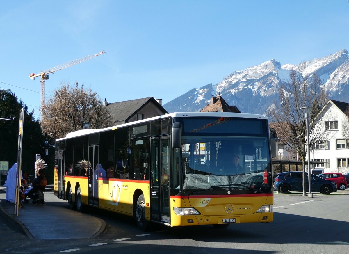 (246'171) - PostAuto Zentralschweiz - Nr. 73/NW 5160/PID 5066 - Mercedes (ex Nr. 22; ex Thepra, Stans Nr. 22) am 16. Februar 2023 beim Bahnhof Stans