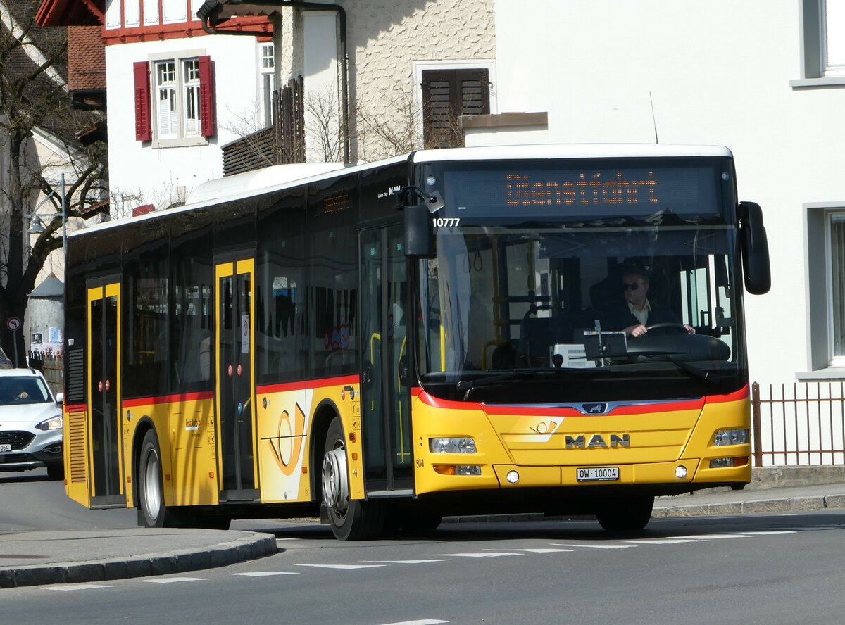 (247'421) - PostAuto Zentralschweiz - Nr. 504/OW 10'004/PID 10'777 - MAN (ex Nr. 10; ex Dillier, Sarnen Nr. 10) am 18. Mrz 2023 beim Bahnhof Sarnen 