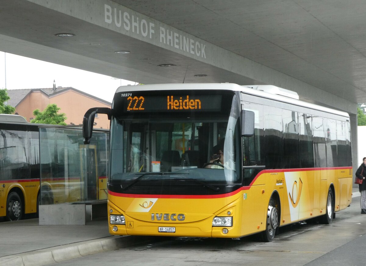 (250'113) - PostAuto Ostschweiz - AR 14'857/PID 10'371 - Iveco am 16. Mai 2023 beim Bahnhof Rheineck