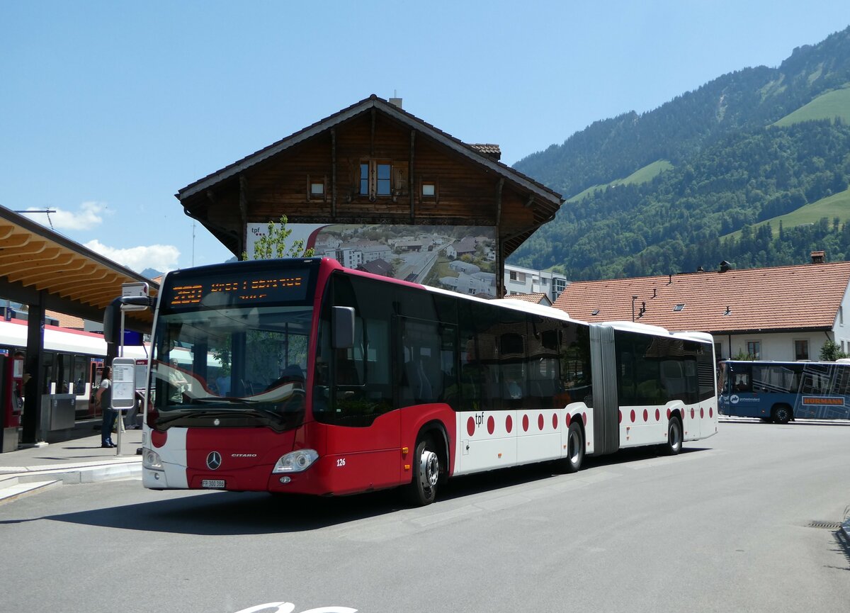 (251'548) - TPF Fribourg - Nr. 126/FR 300'386 - Mercedes am 15. Juni 2023 beim Bahnhof Broc-Village