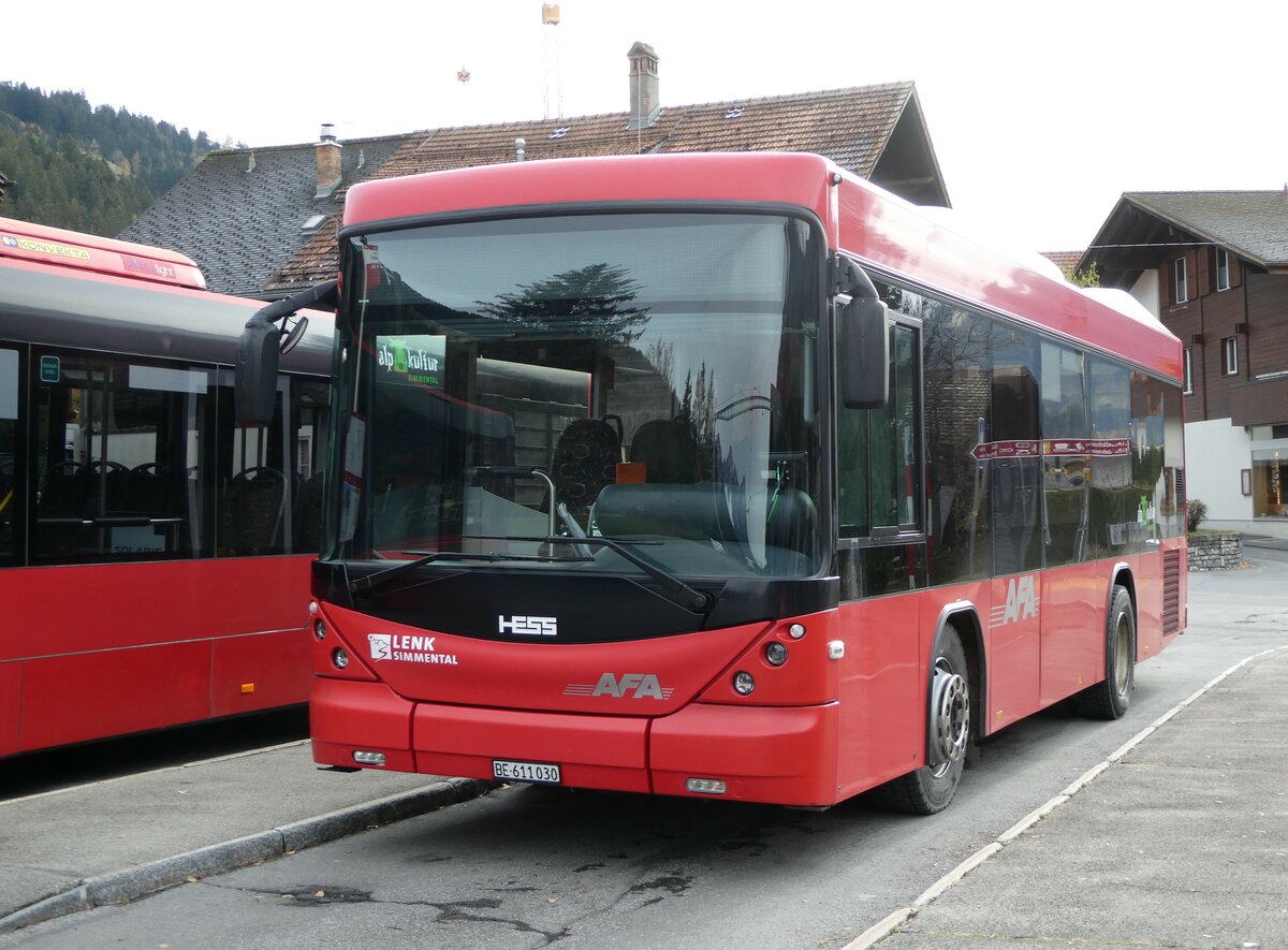 (256'821) - AFA Adelboden - Nr. 56/BE 611'030 - Scania/Hess am 9. November 2023 beim Bahnhof Lenk