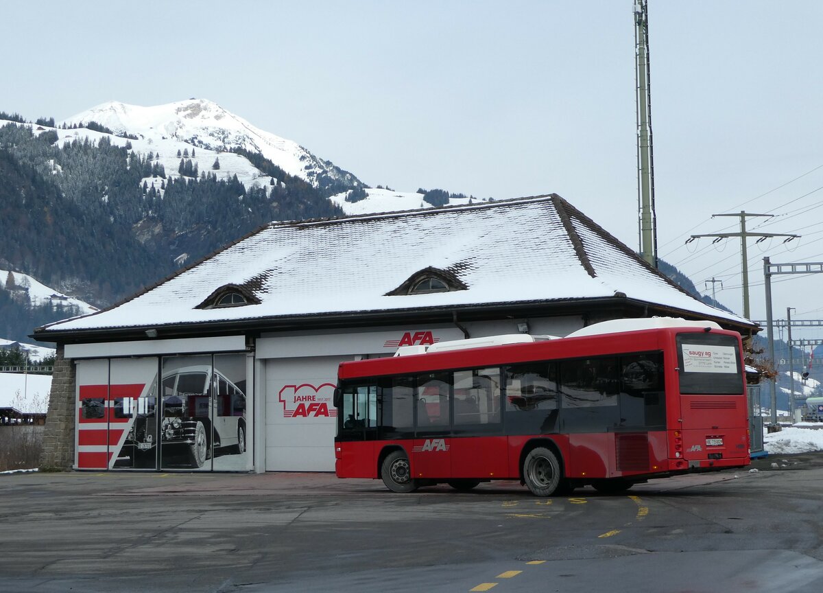 (257'243) - AFA Adelboden - Nr. 50/BE 715'002 - Scania/Hess am 27. November 2023 beim Bahnhof Frutigen