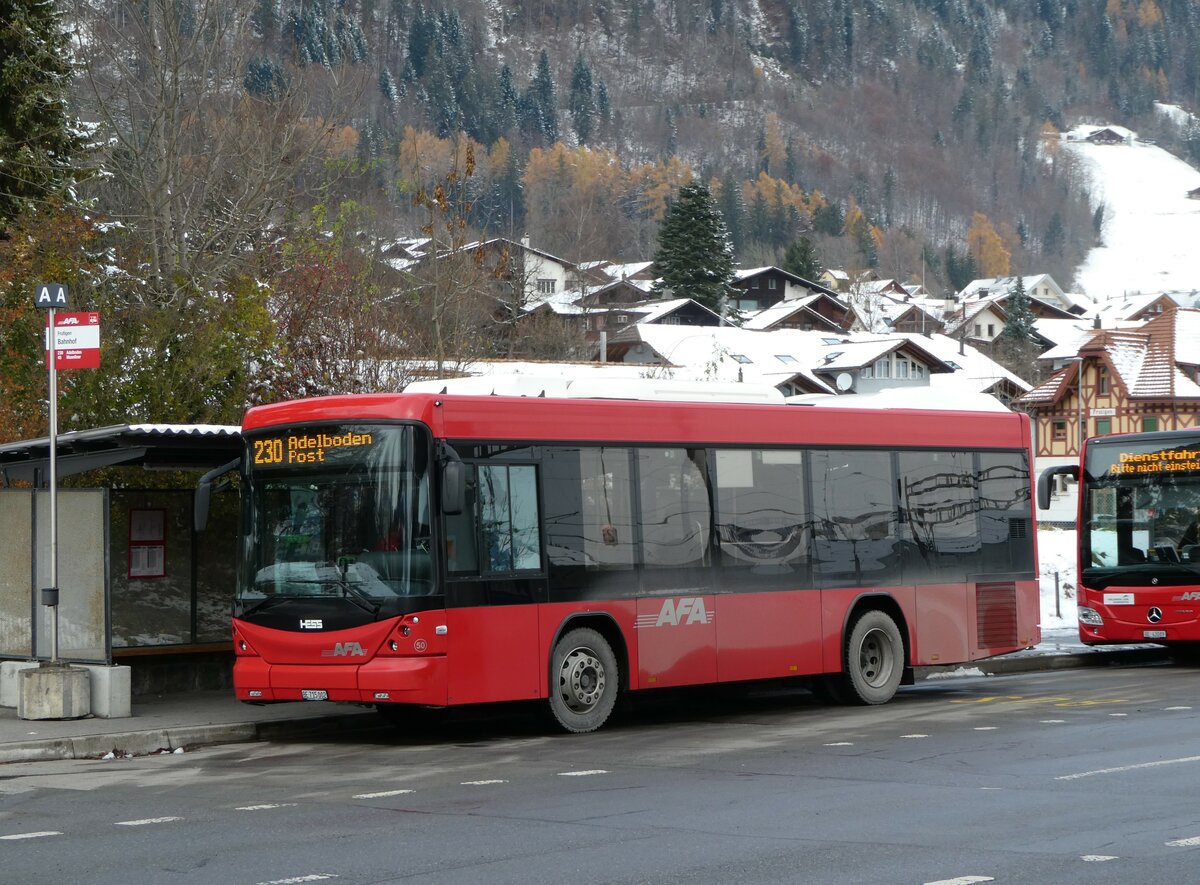 (257'260) - AFA Adelboden - Nr. 50/BE 715'002 - Scania/Hess am 27. November 2023 beim Bahnhof Frutigen