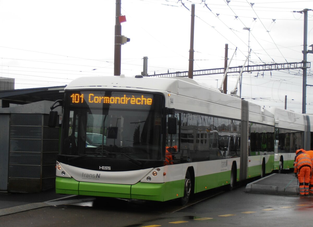 (257'572) - transN, La Chaux-de-Fonds - Nr. 144 - Hess/Hess Gelenktrolleybus (ex TN Neuchtel Nr. 144) am 11. Dezember 2023 beim Bahnhof Marin-pagnier