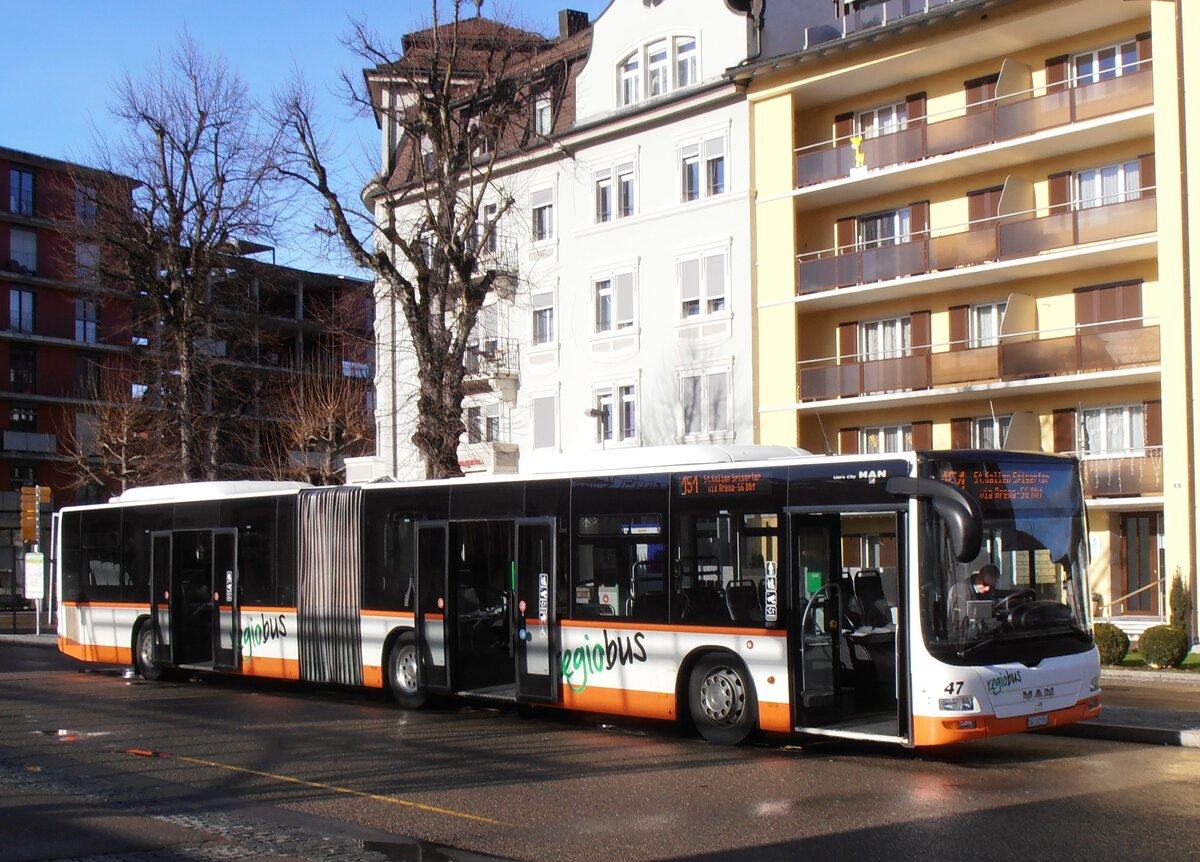(258'116) - Regiobus, Gossau - Nr. 47/SG 332'551 - MAN am 4. Januar 2024 beim Bahnhof Gossau