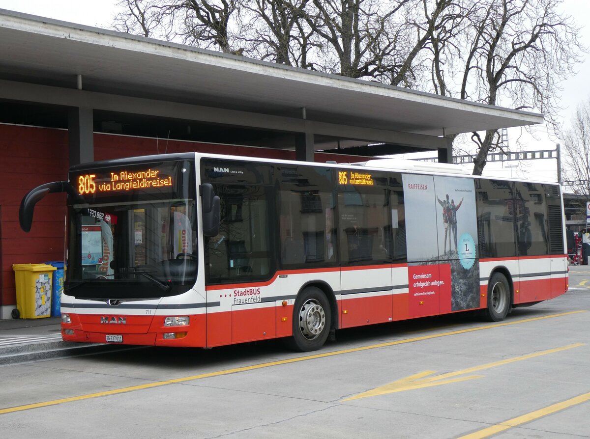 (258'528) - StadtBUS, Frauenfeld - Nr. 711/TG 237'011 - MAN (ex PostAuto Ostschweiz PID 10'103) am 9. Januar 2024 beim Bahnhof Frauenfeld