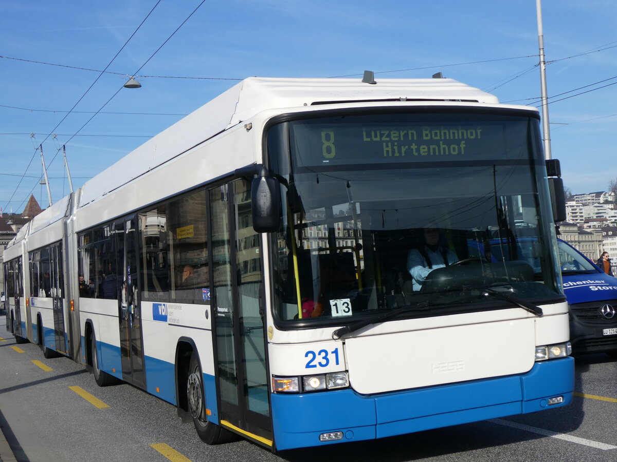 (259'174) - VBL Luzern - Nr. 231 - Hess/Hess Doppelgelenktrolleybus am 6. Februar 2024 in Luzern, Bahnhofbrcke