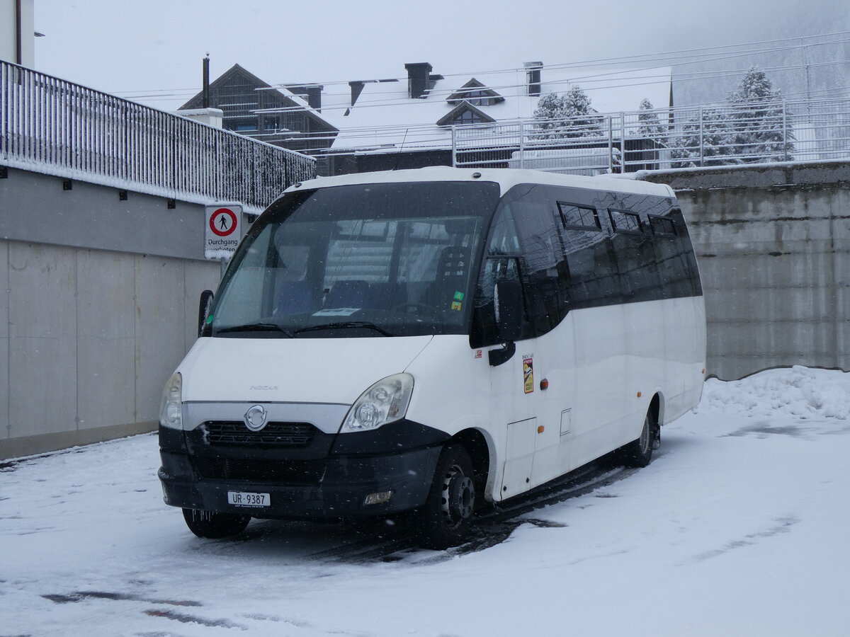 (259'527) - Krone Management, Sarnen - UR 9387 - Irisbus/Indcar am 23. Februar 2024 in Andermatt, Bahnhofplatz