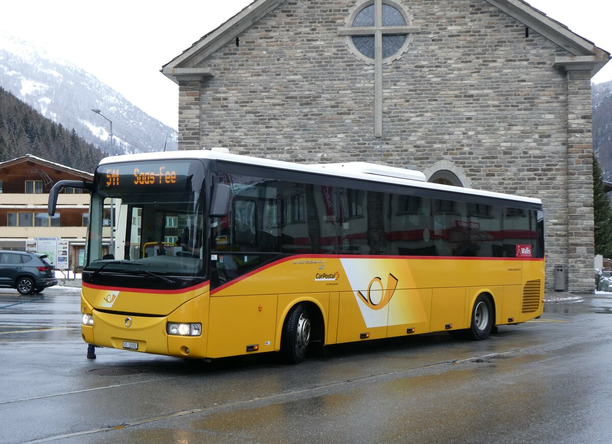 (259'748) - PostAuto Wallis - VS 32'092/PID 5460 - Irisbus (ex CarPostal Ouest) am 27. Februar 2024 in Saas-Grund, Post