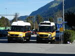 Mercedes/756080/229258---postauto-graubuenden---nr (229'258) - PostAuto Graubünden - Nr. 11/GR 49'912 + Nr. 2/GR 162'984 - Mercedes am 15. Oktober 2021 beim Bahnhof Ilanz