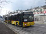 (224'041) - PostAuto Bern - Nr. 662/NE 165'363 - MAN (ex BE 610'549) am 7. Mrz 2021 beim Bahnhof Neuchtel
